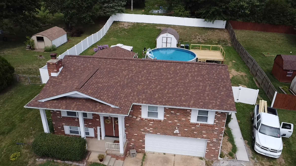 W&W Roofing red asphalt shingles